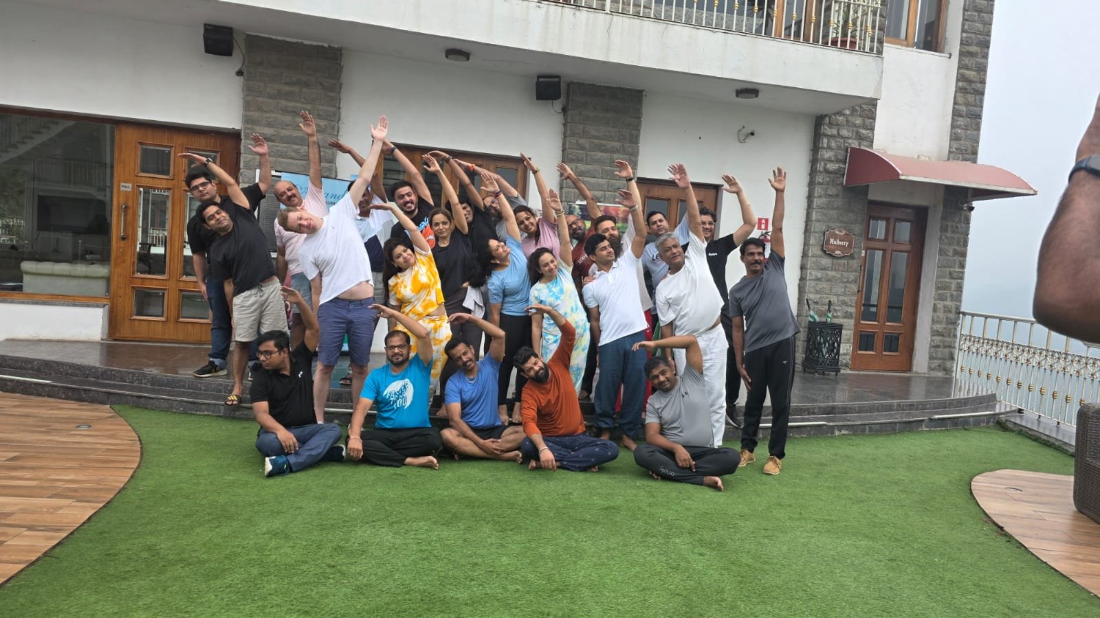 Group yoga session at Kasauli